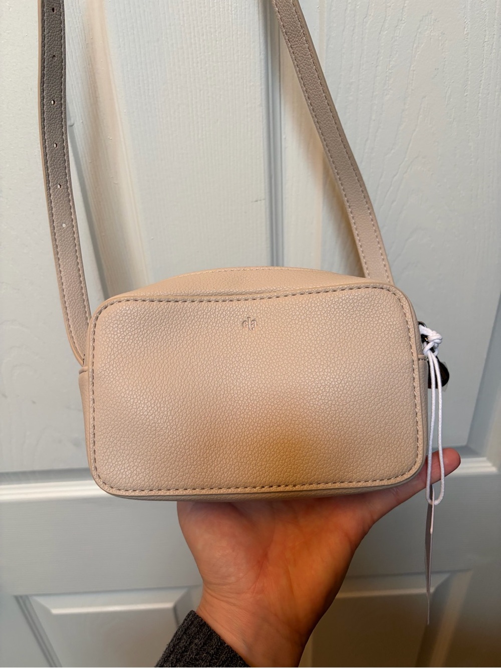 Ela for Jilly Box Minimalist Crossbody Belt Bag in colour Dove Pebble